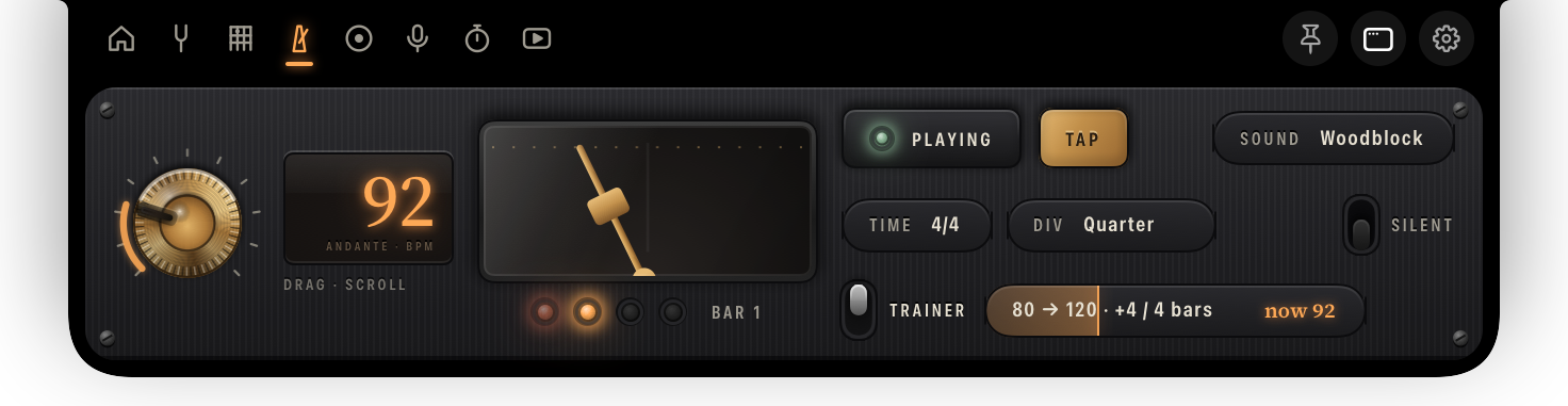 The metronome panel: a brass tempo knob, 92 andante on an amber display, a pendulum in its window, beat lamps and the speed trainer.
